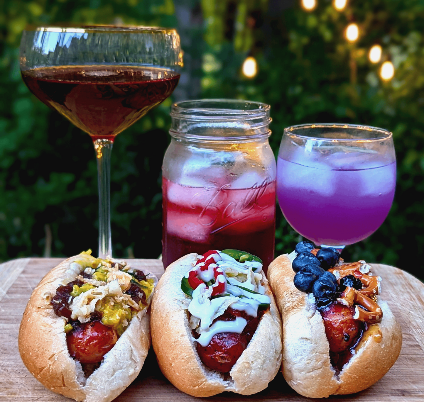 Gourmet hot dogs with cocktail pairings